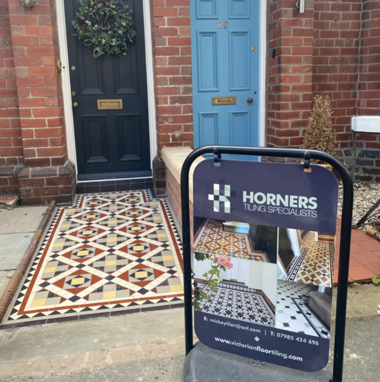 Victorian geometric tiled front path and doorstep at a red brick terrace